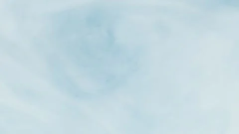 Abstract pastel light blue ink slowly swirling and dissolving in water, cre.. Stock Footage 335139209