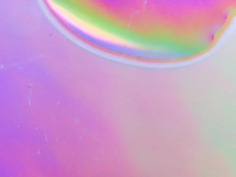 Abstract pastel rainbow light gradient on smooth iridescent surface Foto stock