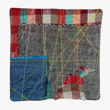 Abstract patchwork fabric sample close up detail 库存照片