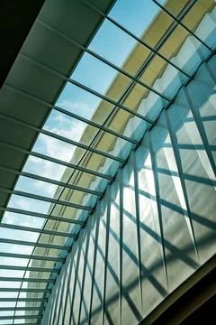 Abstract pattern of building structure of glass ceiling, light, and shadow, w 스톡 사진