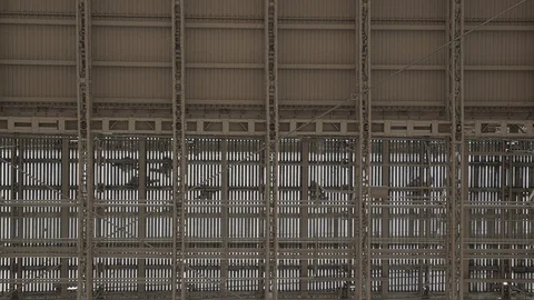 Abstract pattern construction walking people silhouettes Brooklyn Bridge NYC Vídeos de archivo 120576905
