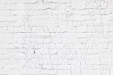 Abstract pattern of cracks in white washed wall Stock Photos