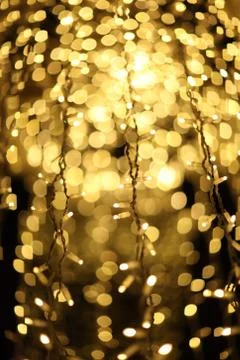 Abstract pattern created by reflection of lights holiday illumination. Stock Photos