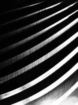 An abstract pattern of curved lines on a black background Stock Photos