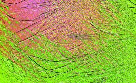 An abstract pattern featuring vivid green and pink colors. The texture is i.. Stockillustratie