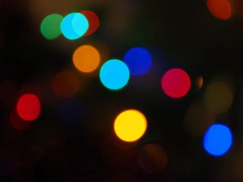 Abstract pattern of to focus colourful lights on a dark background Stock Photos