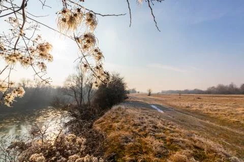 Abstract pattern with fresh snow on a sandy river beach 写真素材
