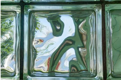 Abstract pattern in a glass block. Stock Photos