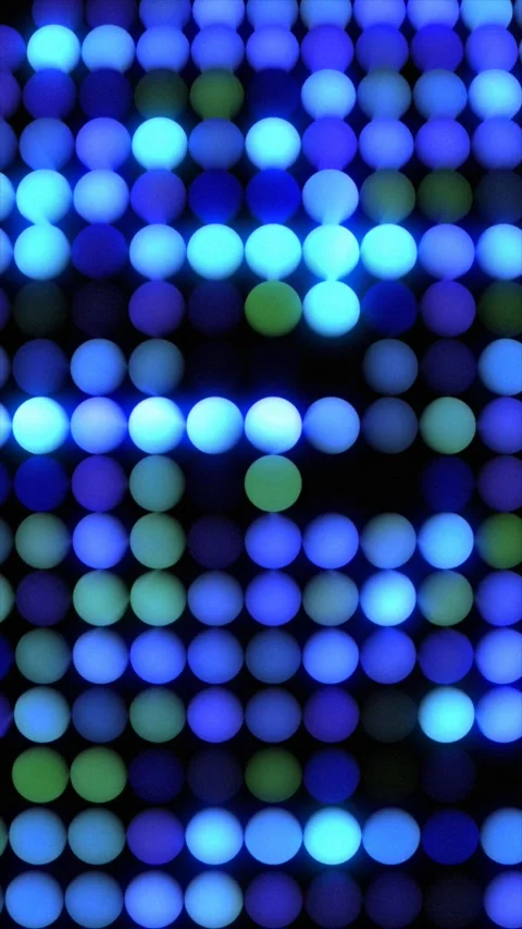 Abstract pattern of glowing blue and green circles illuminating Stock Footage 329069275