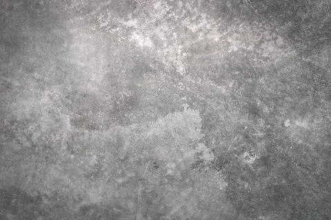 Abstract pattern of grainy surface. weathered and uneven gray wall with gradi 스톡 사진