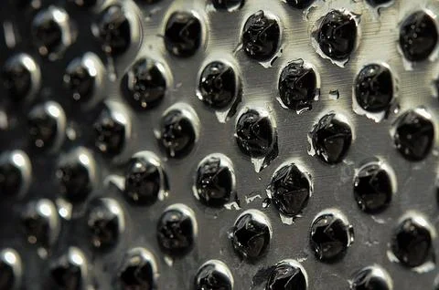 Abstract Pattern of Grater Holes Stock Photos