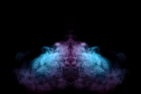 Abstract pattern of green and pink smoke with flames on a black background. P Stock Photos