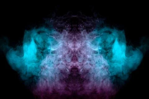 Abstract pattern of green and pink smoke with flames on a black background. P Stock Photos