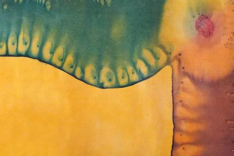 Abstract pattern on handmade silk batik abstract yellow and green contour ... Stock Photos