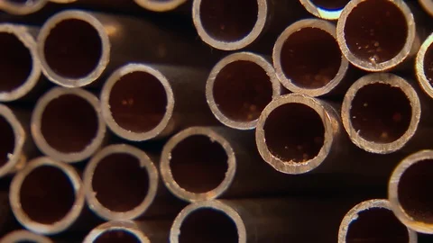 Abstract Pattern Heap of Copper Tubes Factory After Production Line Metal Hive Stock Footage 127812502