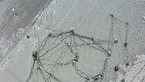 Abstract Pattern on Ice Surface in the South Urals Stock Footage 318492150