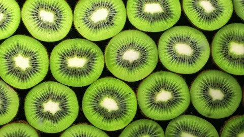 Abstract pattern with kiwi green fruit macro with water drop . Natural green 스톡 동영상 183375808