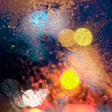 Abstract pattern of light spots and drops of water on glass Stock Photos