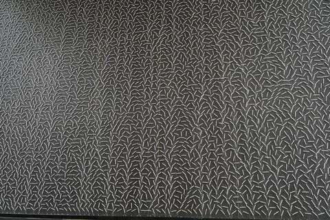 Abstract Pattern of Lines on Dark Surface Background Foto stock