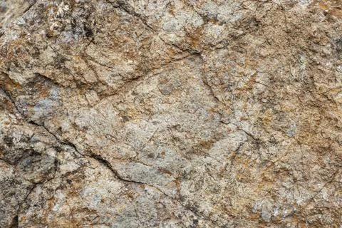 Abstract pattern of a mountain boulder, rock wall texture ,with brown rusty.. Stock Photos