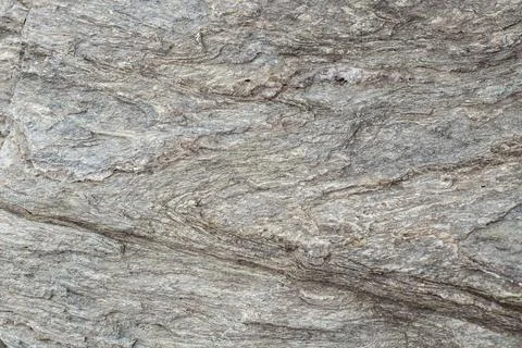 Abstract pattern of a mountain boulder, rock wall texture ,with brown rusty.. 스톡 사진