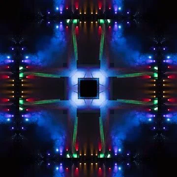 Abstract pattern, multi-colored kaleidoscope from photos light and smoke Foto stock