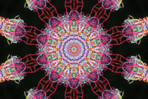 Abstract pattern of multicolored threads on a black background Illustrazione stock