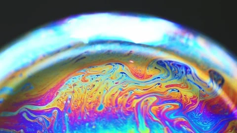 Abstract pattern, rainbow chaotic texture inside of the soap bubble, closeup 스톡 동영상 163016371