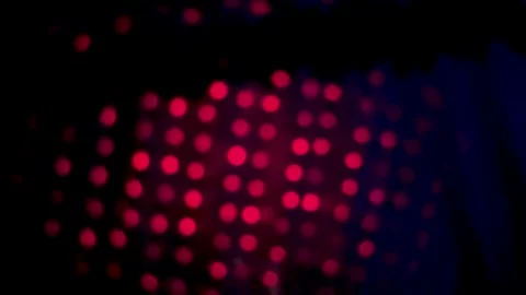 Abstract pattern of red dots forming a mesmerizing grid against a dark back.. Stock Footage 339425309