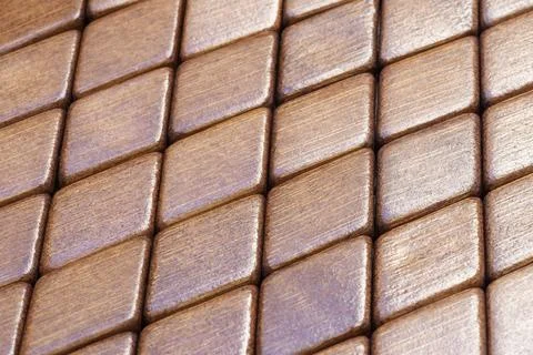 Abstract pattern of rhombus brown bamboo wood pieces Stock Photos