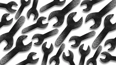 Abstract pattern of scattered wrenches and tools on white background Stock Footage 325146907