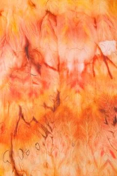 Abstract pattern on silk fabric texture in yellow and brown tones Foto stock