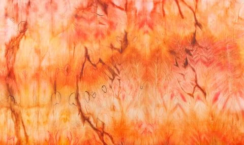 Abstract pattern on silk fabric texture in yellow and brown tones Stock Photos