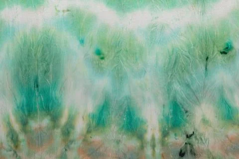 Abstract pattern on silk fabric texture in green tones Stock Photos