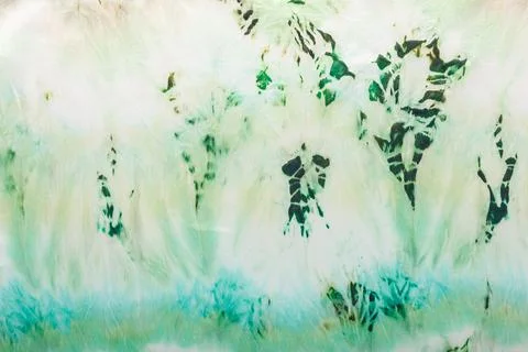 Abstract pattern on silk fabric texture in green tones Stock Photos
