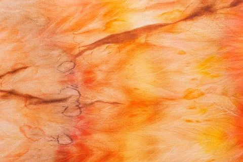 Abstract pattern on silk fabric texture in yellow and brown tones Stock Photos