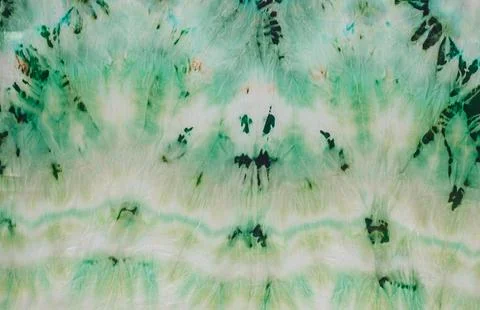 Abstract pattern on silk fabric texture in green tones Stock Photos