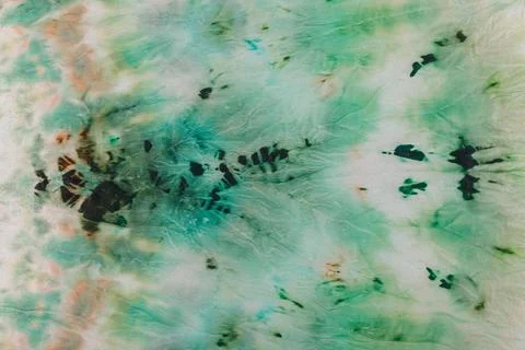 Abstract pattern on silk fabric texture in green tones Stock Photos
