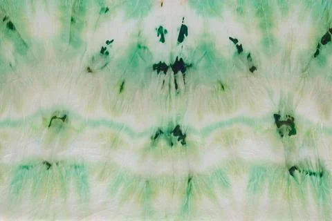 Abstract pattern on silk fabric texture in green tones Stock Photos