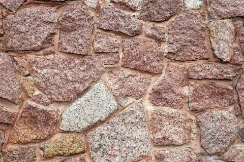 Abstract pattern of a stone wall Stock Photos