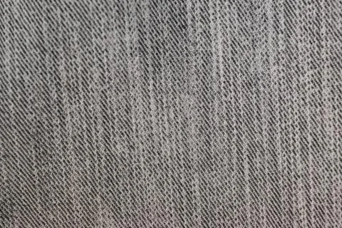 Abstract a pattern texture of fabric or paper for a background or wallpaper. Stock Photos