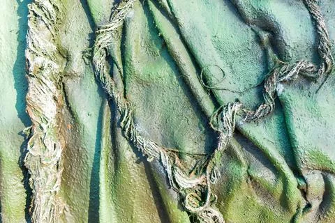 Abstract pattern from threads and ropes of green color 库存照片