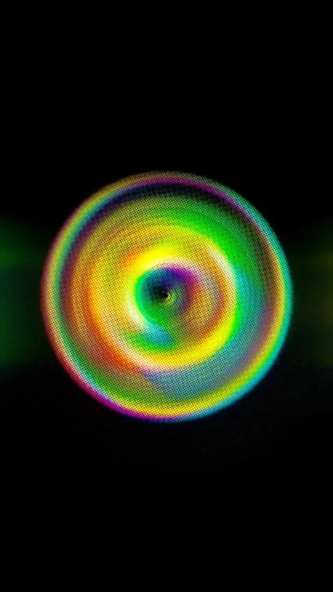 An abstract pattern of vibrant colors spirals inward resembling an eye Video stock 319779690