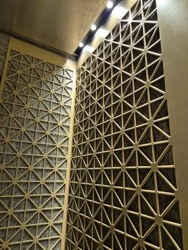 Abstract pattern wall in a hotel elevator, geometric shapes Stock Photos