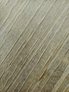 An abstract pattern on a wall resulting from a layer of white plaster 写真素材