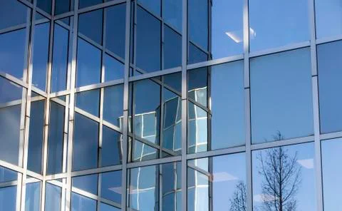 Abstract patterns and reflections in windows of modern office buildings Fotos de archivo