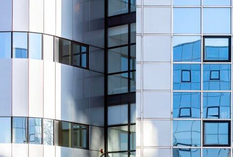 Abstract patterns and reflections in windows of modern office buildings Stock Photos