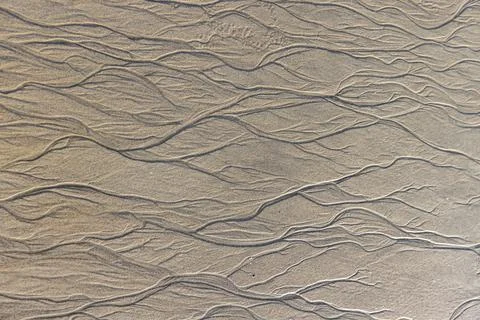 Abstract patterns on beach sand Foto stock