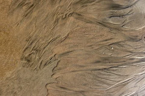 Abstract patterns on beach sand Foto stock