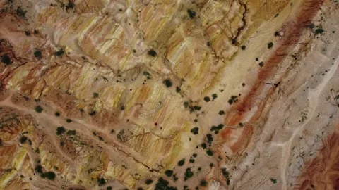 Abstract patterns of colorful clay folds at Fairytale Canyon Skazka Kyrgyzstan Stock Footage 342831895